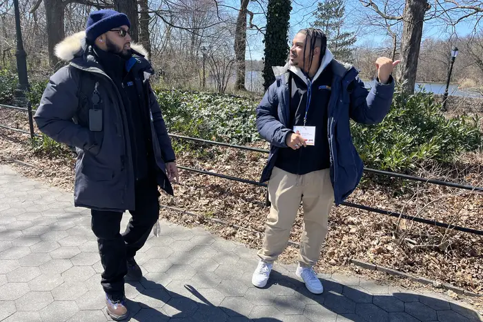 Two men speak in Brooklyn's Prospect Park